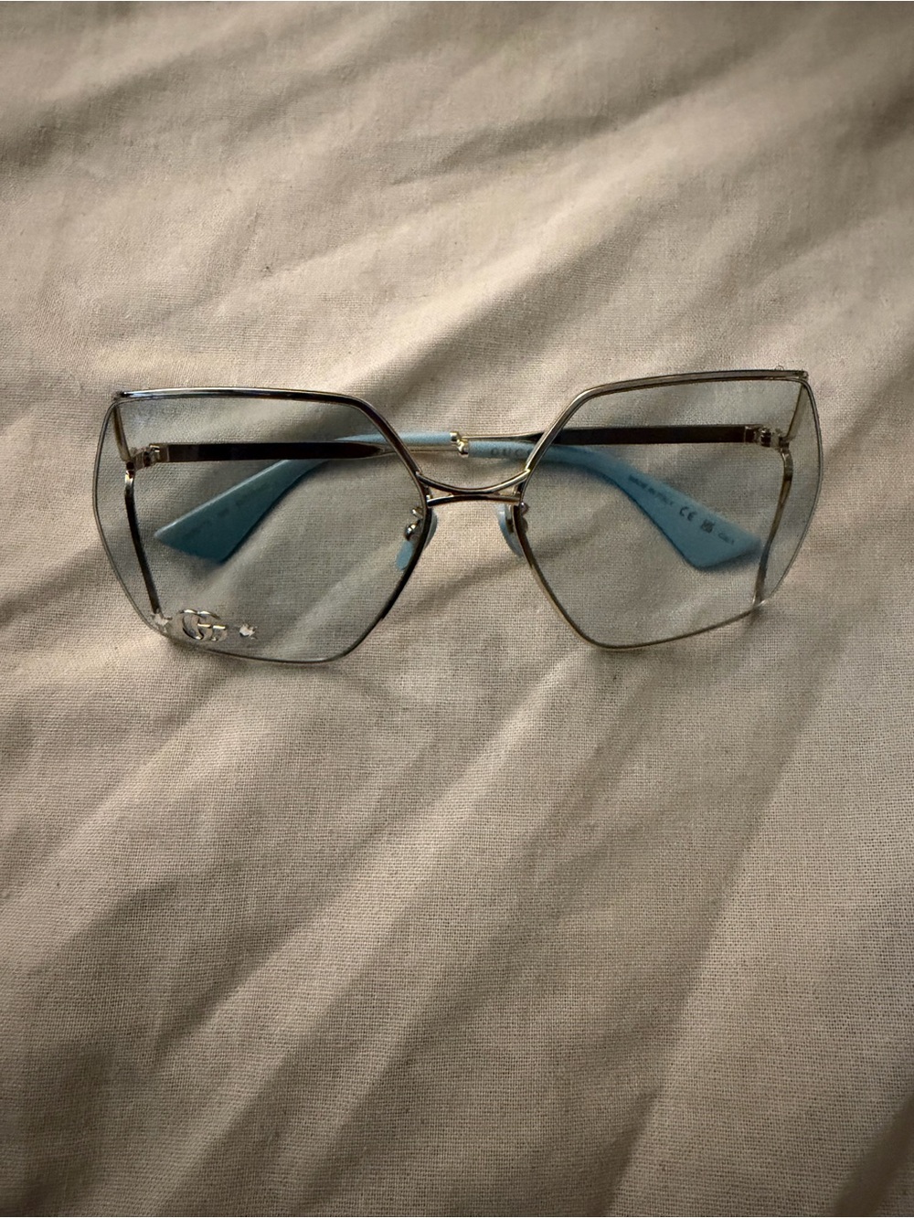 Gucci Gold Rim Sunglasses with Light Blue lens